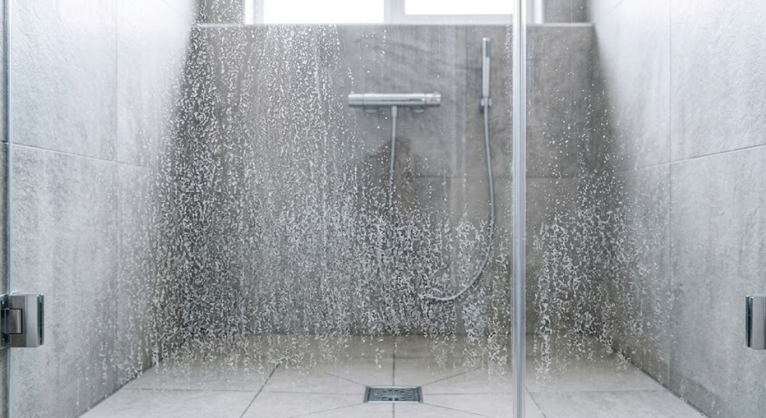 How to Remove Hard Water Stains from Glass Shower Doors and Surfaces