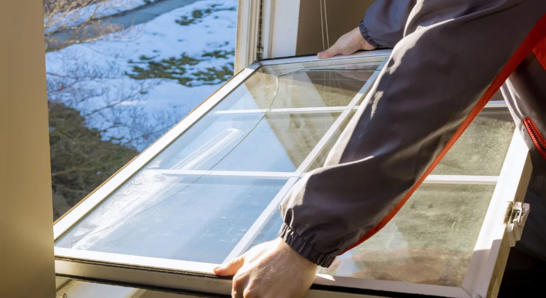Residential window being repaired by a glazier