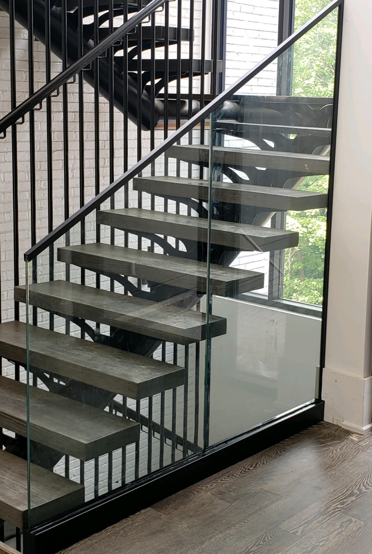Glass stair railing installation